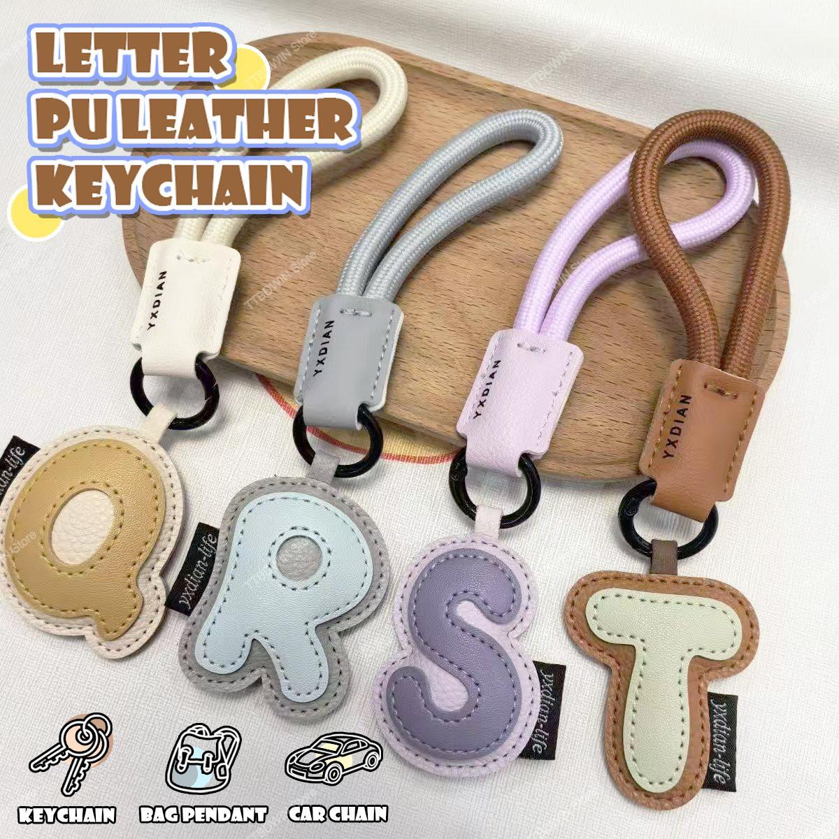 Monogram Keychain Leather - Брелок из искусственной кожи с 26