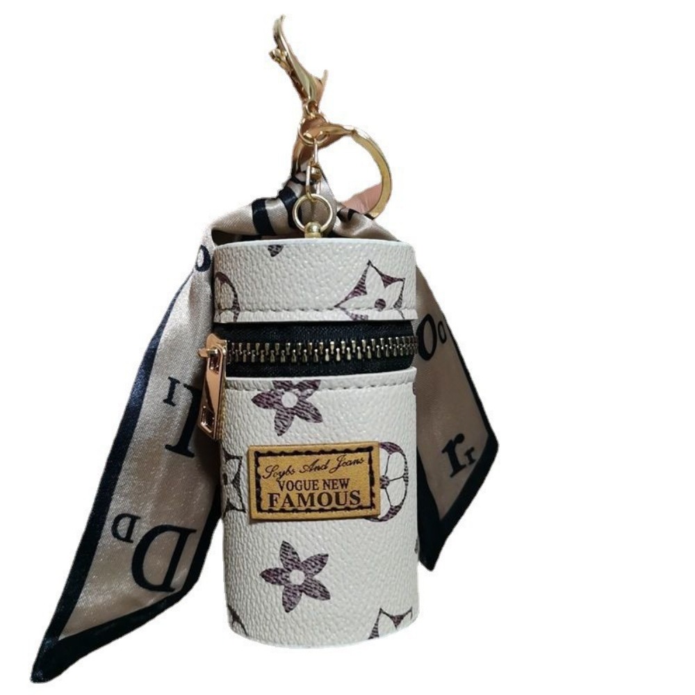 Черно-золотой цилиндрический м – обзор и цена Monogram Keychain Leather